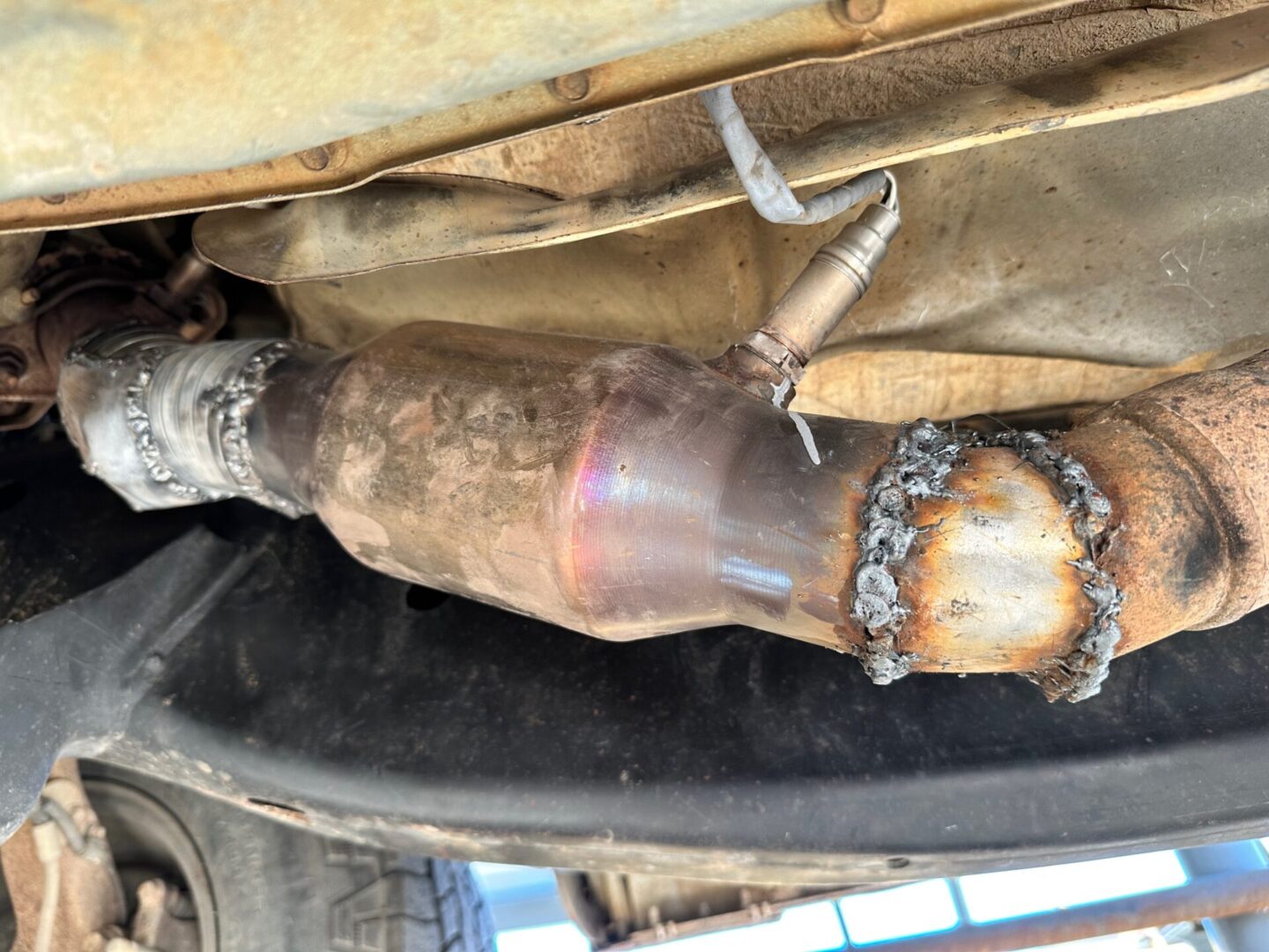 A closeup look of a B and M Muffler and Auto Repair